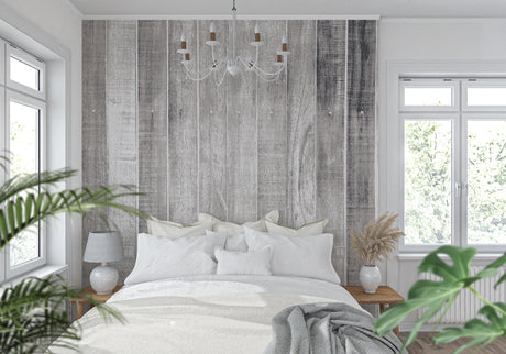Grey wood plank wallpaper creating a cozy atmosphere in modern living room with minimal furniture