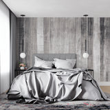 Rustic grey wood wall mural adding warmth to a contemporary bedroom setting