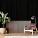 Wood pattern mural creating height in narrow hallway with pendant lighting