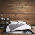 Wood plank wallpaper creating a cozy atmosphere in a modern living room with natural light