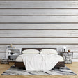 White wood plank wallpaper creating a bright, airy feel in a modern living room with natural light