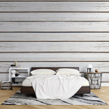 White wood plank wallpaper creating a bright, airy feel in a modern living room with natural light