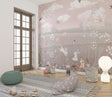 Woodland animal wallpaper in pink and grey tones creating a magical atmosphere in a modern nursery