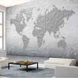 3D World Map Wallpaper in modern home office with grey furniture and natural light
