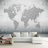 Grey relief map wallpaper in minimalist living room setting