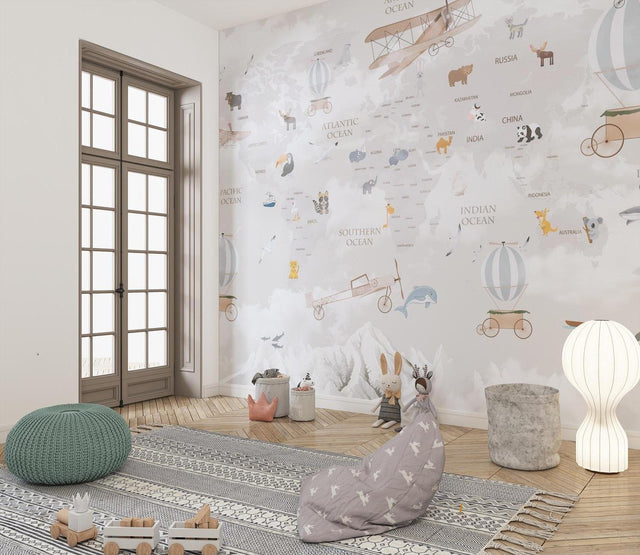 World Map Wallpaper in bright kids bedroom, showing animals and airplanes creating an educational play space