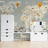 Kids world map wallpaper installed in home study area with desk