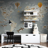 Animal world map mural displayed in nursery with reading nook