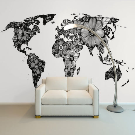 Black and white floral world map wallpaper in modern home office with desk and chair setup