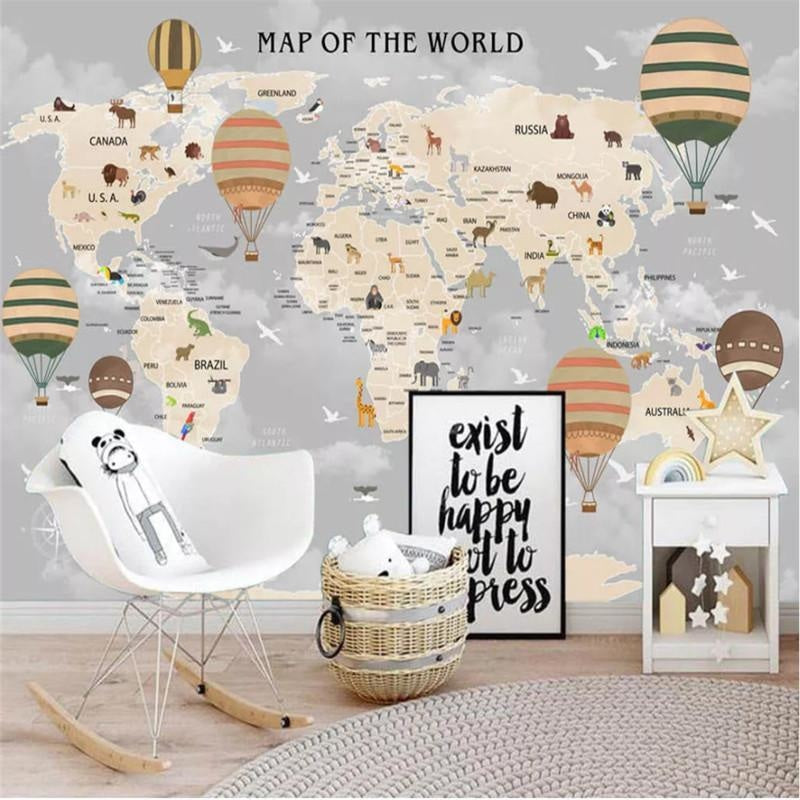 World map wallpaper in bright kids bedroom showing continents and animals, creating an educational play space