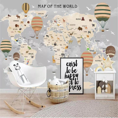 World map wallpaper in bright kids bedroom showing continents and animals, creating an educational play space