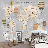 Educational map mural in home study area with desk and reading nook