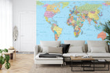 Educational World Map Wallpaper displayed in modern home office with desk and natural lighting