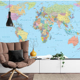 Colorful World Map Mural featured in children's study room with reading nook
