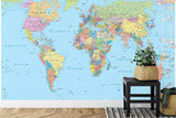 World Map Wall Mural showcased in school classroom setting with modern furniture