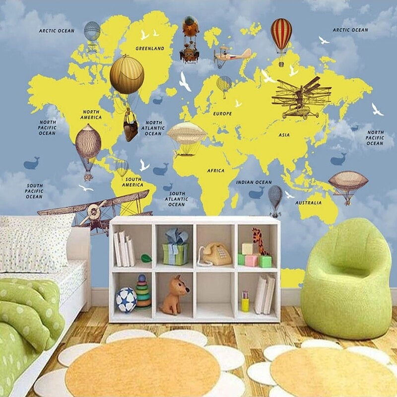 Educational map mural featured in modern playroom with reading nook