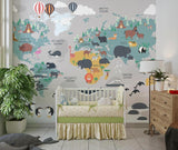 Animal world map mural brightening a nursery with white furniture