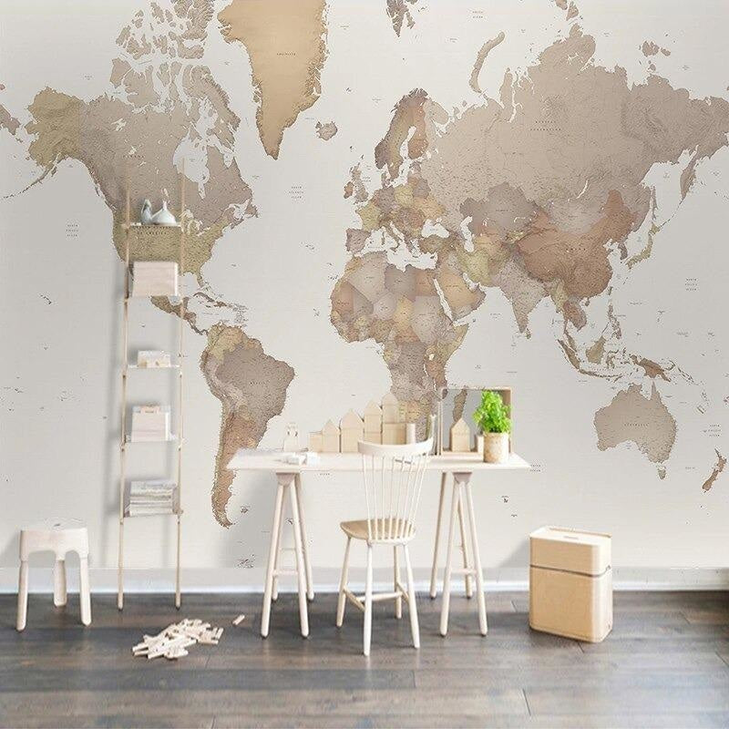 Elegant world map mural in a study room with desk and reading nook
