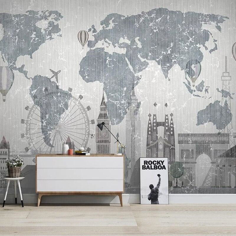 World Map Wall Mural featured in stylish living room setting with grey furniture