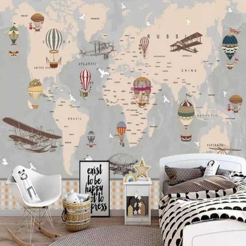 Adventure map wall mural featuring vintage planes in a cozy nursery setting