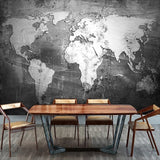 Industrial map mural adding sophistication to a contemporary living room setting