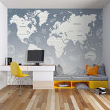 Space-themed world map mural in playroom setting