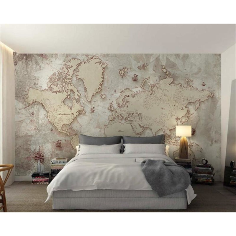 Vintage World Map Wallpaper creating a sophisticated atmosphere in a modern home office with wooden furniture