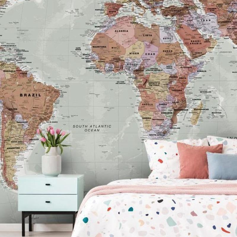 Pastel World Map Wallpaper in living room with minimalist furniture