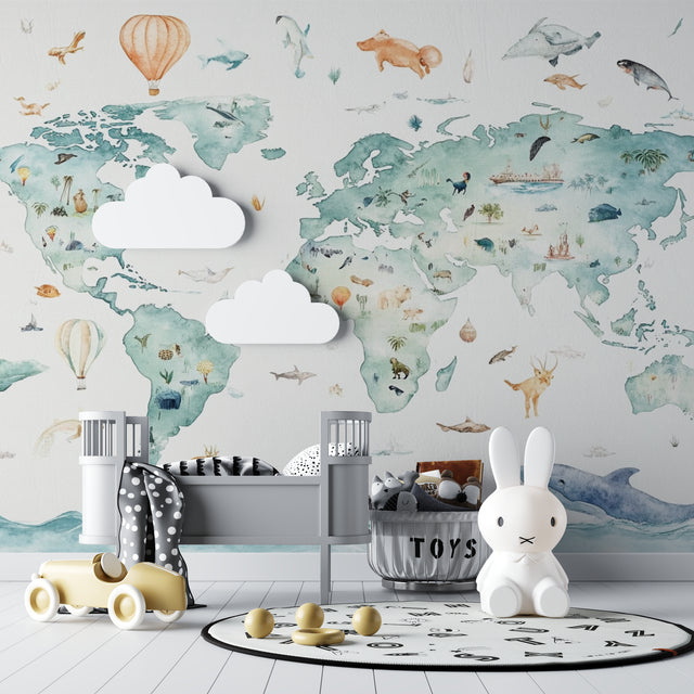 World map wallpaper with watercolor animals in bright modern nursery, creating an educational play space