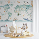 Kids bedroom featuring educational world map mural with playful watercolor animals