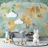Educational world map mural featuring watercolor animals in a child's study room