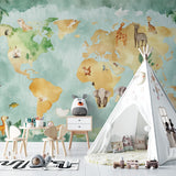 World map with animals wallpaper displayed in a bright homeschool classroom