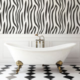 Modern living room featuring striking Zebra print wallpaper mural, showing black and white pattern in contemporary setting